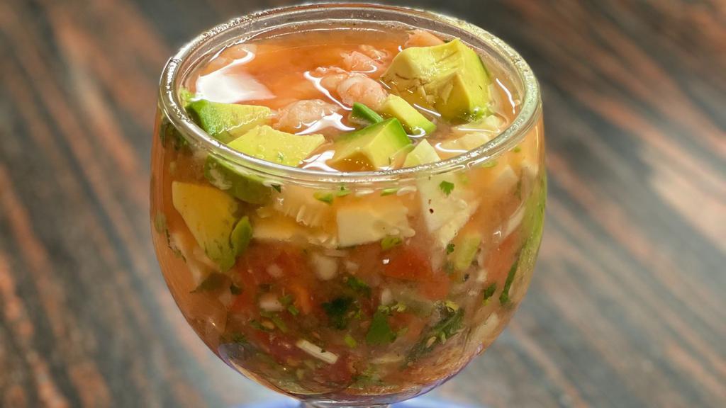 Camaron · Shrimp, Avocado, Tomato, Onion, Cilantro, in a Tomato juice cocktail. Very Refreshing!