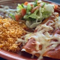 Enchiladas · Choice of Chicken, Beef, or Cheese, with either Red, or Green sauce. Served with Rice, Beans...