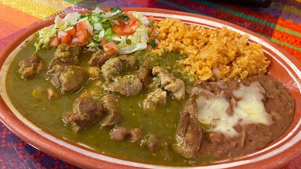 Chile Verde · Pork slowly simmered in our House-Made Green Sauce. Served with Rice, Beans, and your choice of Tortillas.