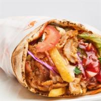 Chicken Shawarma Pita Wrap  · Boneless chicken marinated with chef secret blend of spices.