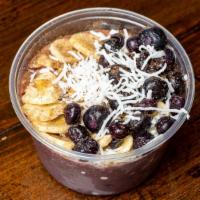 Acai Bowl · Acai berry puree with blueberries, strawberries, coconut and banana. Topped with fresh straw...
