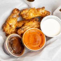 1/2 lb Smoked Chicken Wings · A half dozen smoked chicken wings, served with your choice of dipping sauce