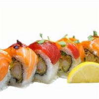 Sweet Fantasy · In: shrimp tempura, cucumber & mango, Out: tuna, salmon, micro green w/ balsamic reduction.