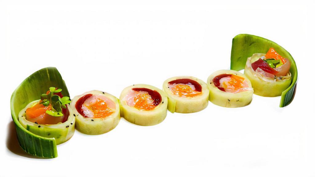Cu Kani · No rice. In: crab, tuna, salmon & hamachi. Out: wrapped in cucumber ring w/ ponzu sauce.