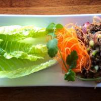 Larb Impossible · Ground Impossible meat, sliced red onion, mint leaves tossed in chili-lime dressing. Gluten-...