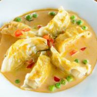 Steamed Dumpling with Curry Sauce · Chicken and vegetable dumplings with curry sauce, topped with diced bell peppers and kaffir ...