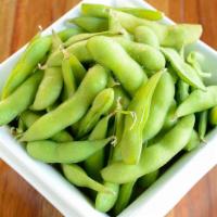 Steamed Edamame with Sea Salt · Steamed japansese soy beans with sea salt. Gluten-free and vegan.