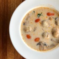 Tom Kah · Mild spicy. Coconut soup with chicken, mushroom, lemongrass, galanga (kah), and kaffir lime ...