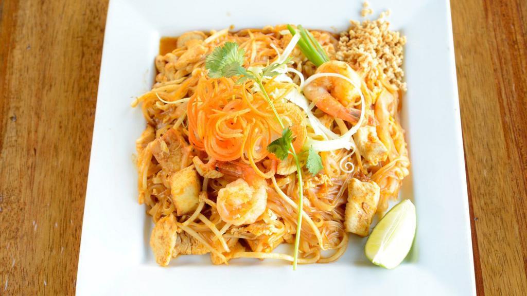 Pad Thai · Gluten-free, not spicy. Rice noodles with shrimp and chicken, egg, scallions, tofu, and bean sprouts served with crushed peanut.
Vegan, and vegetarian option available upon request.