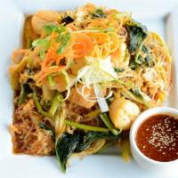 Stir Fried Thai Seafood Sukiyaki · Stir-fried silver noodles, prawns, scallops, sole, egg, spinach, napa cabbage with Thai suki...