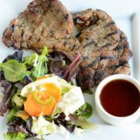 Rib-Eye Steak Panang · (Nuer yang panang) grilled rib-eye steak USDA choice over string beans, fresh tomatoes, topp...