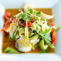 Steamed Sea Bass with Ginger · Sea‎ bass marinated in sake, steamed with bell peppers, cabbage, green onion, and fresh ging...