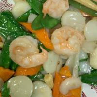 Rainbow Prawns & Scallop · Fresh sautéed prawns and scallop with ginger, onion, snow peas, baby corn and carrot in our ...
