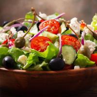 Mediterranean Salad · Lettuce, carrots, kalamata olives, cucumbers, and onions.