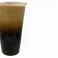 Iced King Milk Coffee · Traditional Thai Coffee with Half and Half milk with Ice. Thai Coffee brewed in.