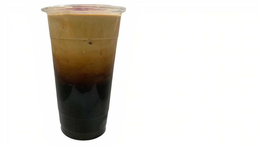 Iced King Milk Coffee · Traditional Thai Coffee with Half and Half milk with Ice. Thai Coffee brewed in.