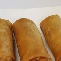 Crispy Egg Rolls (3 Pieces) · Deep fried vegetarian egg rolls stuffed with silver noodle, black mushrooms, carrot and cabb...