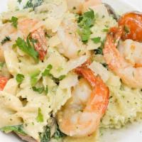 Mediterranean Shrimp Pasta · Jumbo shrimp, bowtie pasta, spinach, mushrooms and cherry tomatoes in a light pesto cream.