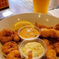 Fried Seafood Platter · Battered with spices, fried shrimp and fish, served with lemon, spicy remoulade and tartar s...