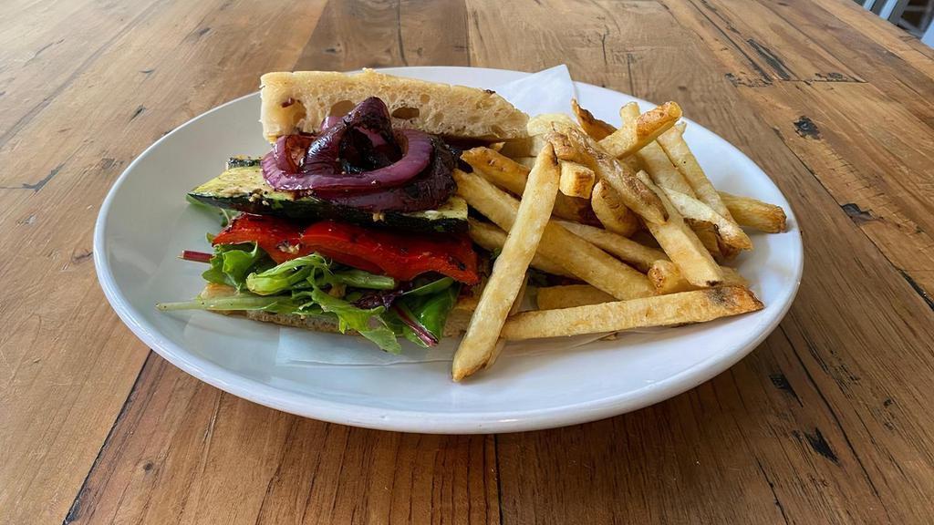 Vegan Pesto Sandwich · Grilled peppers, zucchini, squash, onions, arugula with pesto sauce on Fresh Baked toasted Focaccia. Served with choice of French fries or salad.