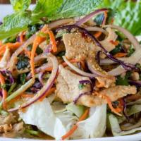 Chicken Larb · Spicy. Thai spicy salad with ground chicken, cilantro, red, and green onions, mint, crushed ...