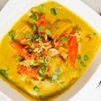 Yellow Curry · Potatoes, white onion, carrot, fried shallot, green onion, and coconut milk.