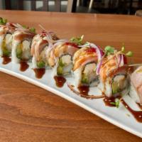 Hollywood · Tempura, avocado, and cream cheese. Topped with lightly seared tuna, salmon, and hamachi. Wi...