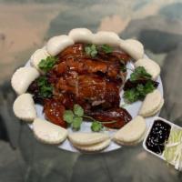 Peking Duck with Steamed Buns 北京片皮鴨 · 