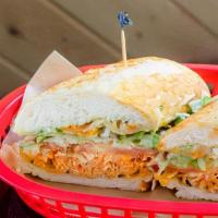 Fire Department · Pulled chicken, habanero peppers, buffalo sauce, ranch sauce, crave sauce, lettuce, and toma...