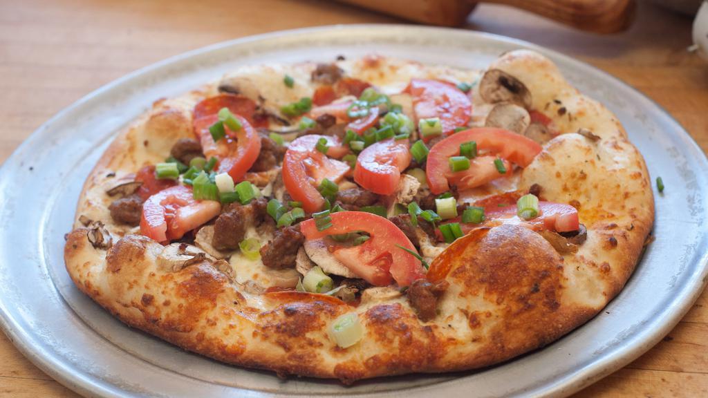 North Beach Lover's Supreme Pizza · White garlic sauce with pepperoni, Italian sausage, mushrooms, green onions and fresh tomatoes.