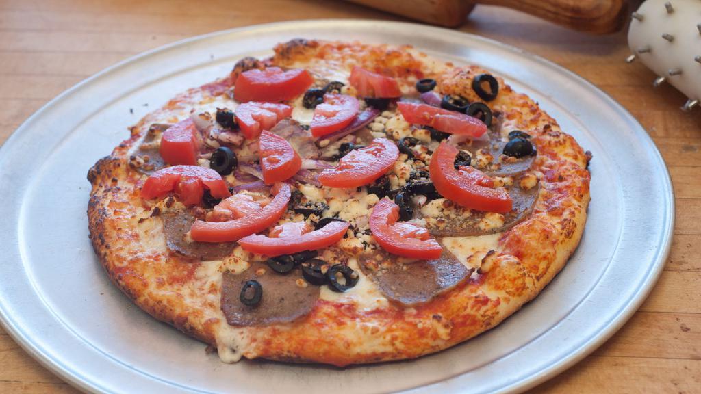 Mediterranean Supreme Pizza · Gyro meat, olives, onions, fresh tomatoes, Feta cheese and oregano.