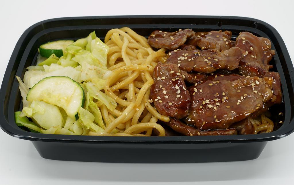 Teriyaki Beef · Served with white rice and vegetables.