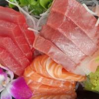 Sashimi (12 Pieces) · Combination of maguro, hamachi and salmon.