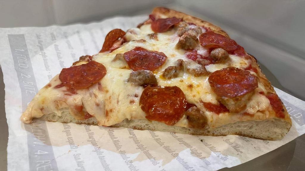 Pan Sausage And Pepperoni Slice · Thick, hand-stretched dough, pan baked, topped with hand-crushed Roman sauce, freshly shredded 100% whole milk mozzarella, sausage, and pepperoni. Made fresh daily..
