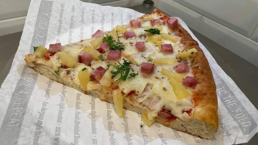 Pan Hawaiian Slice · Thick, hand-stretched dough, pan baked, topped with hand-crushed Roman sauce, freshly shredded 100% whole milk mozzarella, ham, and pineapple. Made fresh daily..