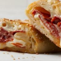 Individual Pepperoni Stromboli · Pepperoni, freshly shredded 100% whole milk mozzarella and Romano cheese rolled in hand-stre...