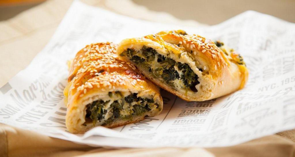 Individual Spinach Stromboli · Spinach, Ricotta, freshly shredded 100% whole milk mozzarella and Romano cheese rolled in hand-stretched dough and baked to perfection, topped with sesame seeds. Made fresh daily..