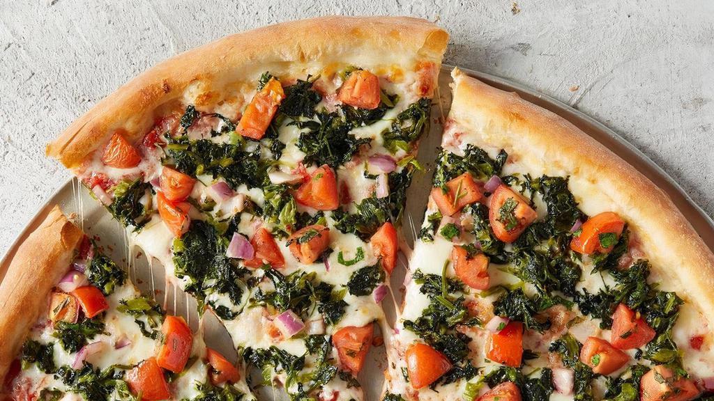 Spinach And Tomato · XL NY pizza made with fresh, hand-stretched dough, topped with San Marzano-style tomato sauce, 100% whole milk mozzarella, spinach, and tomatoes. Made fresh daily..