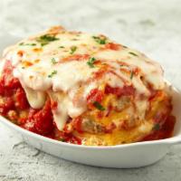 Meat Lasagna · Layered with ricotta and mozzarella cheeses, made with marinara sauce, perfectly seasoned an...