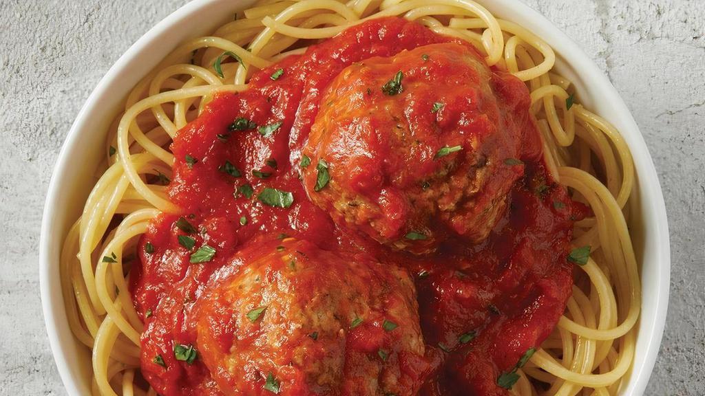 Spaghetti With Meatballs · Spaghetti topped with marinara and two large meatballs and garnished with finely chopped parsley.