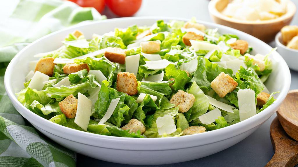 Caesar Salad · Fresh romaine lettuce, croutons, Parmesan cheese and homemade caesar dressing.