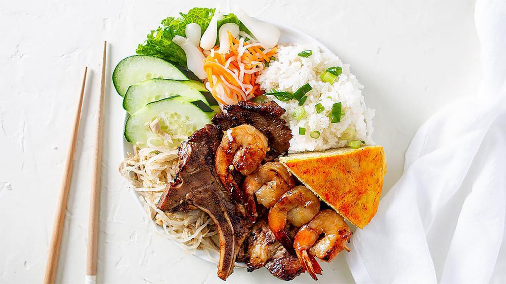 Com Bi, Cha,  Suon Nuong, Tom Nuong · Rice with Shredded Pork Skin,  Egg Cake, BBQ Pork Chop, & BBQ Shrimp