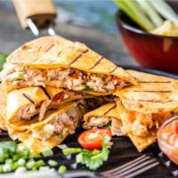 The Chicken Quesadilla · Tender, grilled chicken, and loads of our melty cheese blend folded in a large, soft flour t...