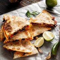 The Veggie Quesadilla · Thinly sliced, fresh, seasonal vegetables including tomatoes, mushrooms, onions and peppers)...