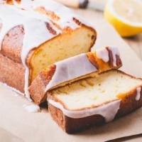 Iced Lemon Pound Cake · Slice of iced lemon pound cake