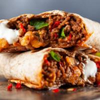 The Game Burrito · Choice of meat, beans, rice, pico de gallo. Served with chips & salsa.