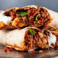 Classic Game Burrito · Beans, cheese, rice. Served with chips & salsa.
