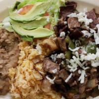 57. Alambre · Chunks of grilled steak, bacon, onion and bell pepper served with rice, beans, salad, and to...
