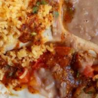 Huevos Rancheros · Two eggs sunny side up, rice, beans and mild salsa.
