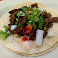 Regular Taco · Meat, onions, cilantro and salsa.